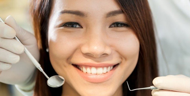 smiling girl dental check up